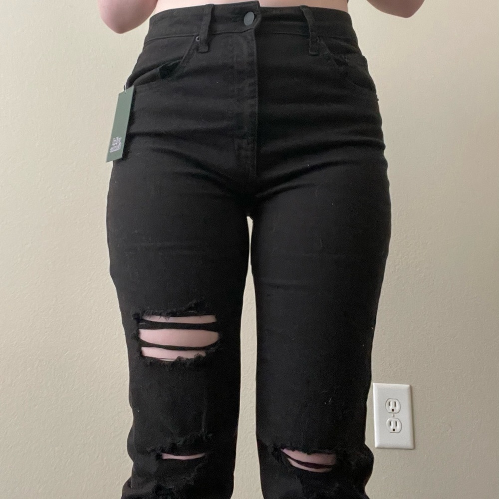 black ripped skinny jeans